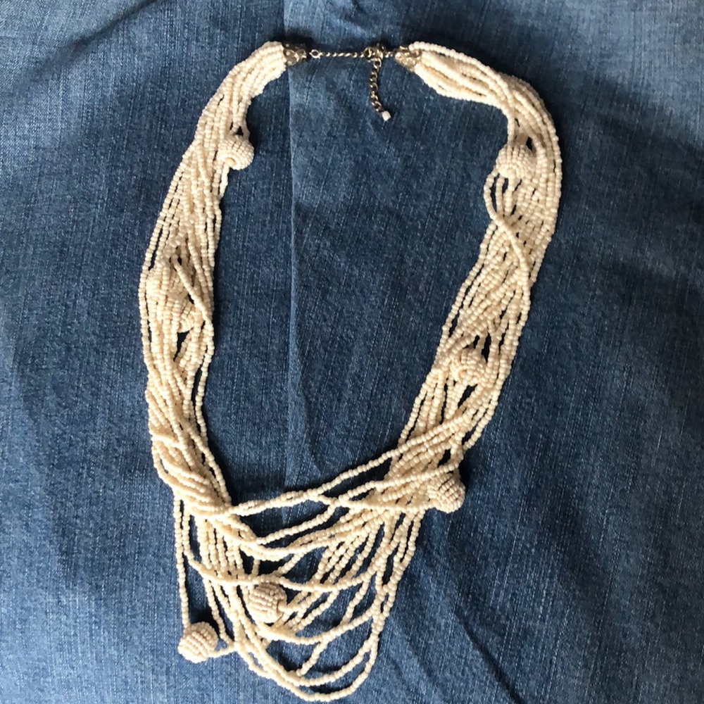 Beaded ivory multi strand necklace